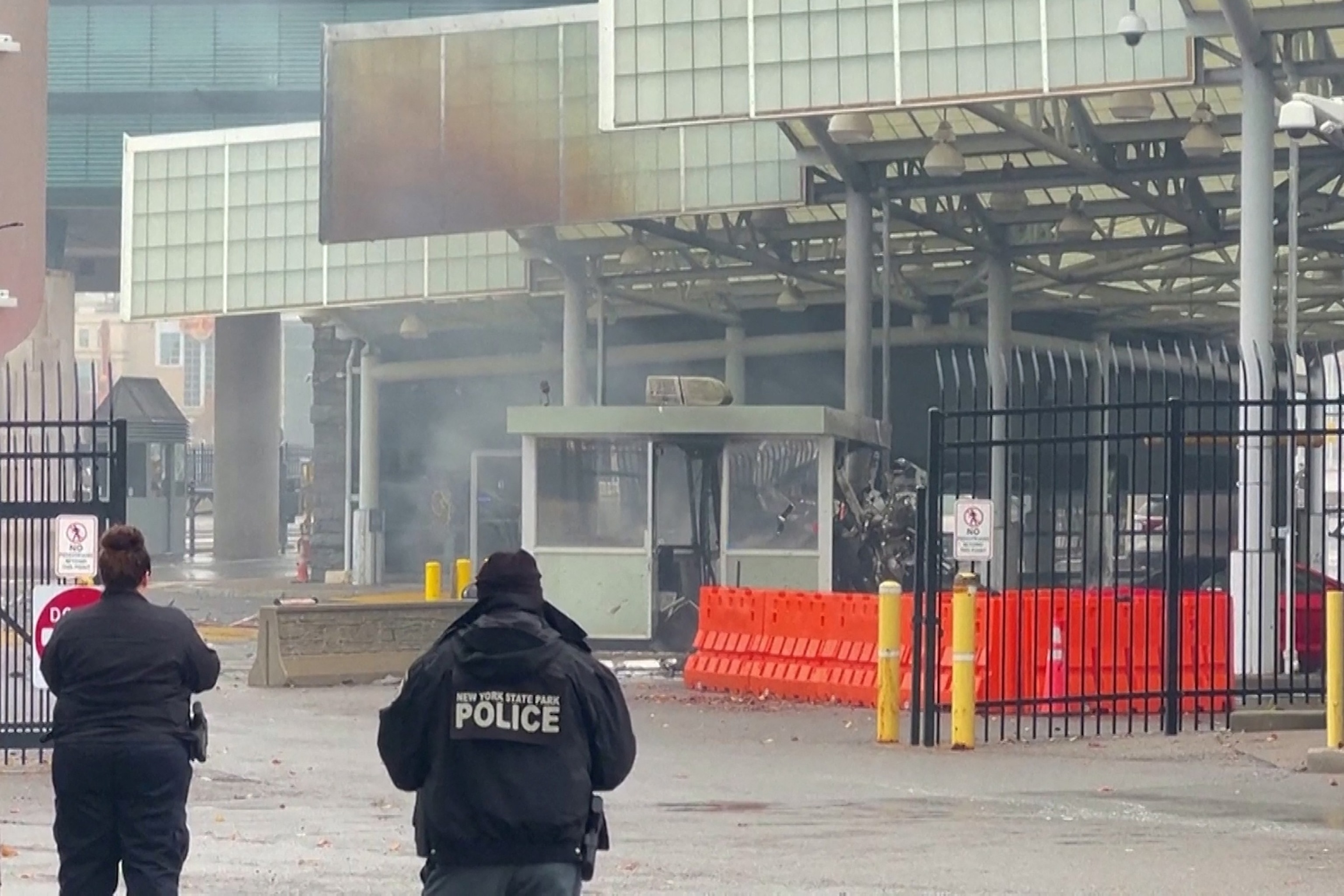 PHOTO: Police officers view the scene after an incident at the Rainbow Bridge U.S. border crossing with Canada, in Niagara Falls, New York, Nov. 22, 2023 in a still image from video.  